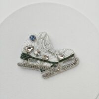 Брошь Коньки