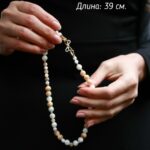 Чокер из перламутра. Этот изысканный чокер выполнен из натурального перламутра, который привнесёт в ваш образ мягкий сияющий оттенок и элегантность.