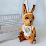 Логотип Плюшевое счастье — где рождаются верные друзья!