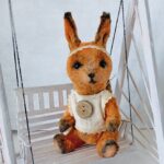 Логотип Плюшевое счастье — где рождаются верные друзья!