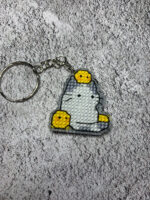 Брелок "Задумчивый котик" — стильный аксессуар и талисман