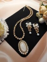 Комплекты колье и серьги