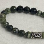 Логотип Мастерская «Камни от Светланы»: гармония природы в каждом украшении