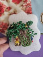 Брошь-трансформер "Качели", вязаная крючком